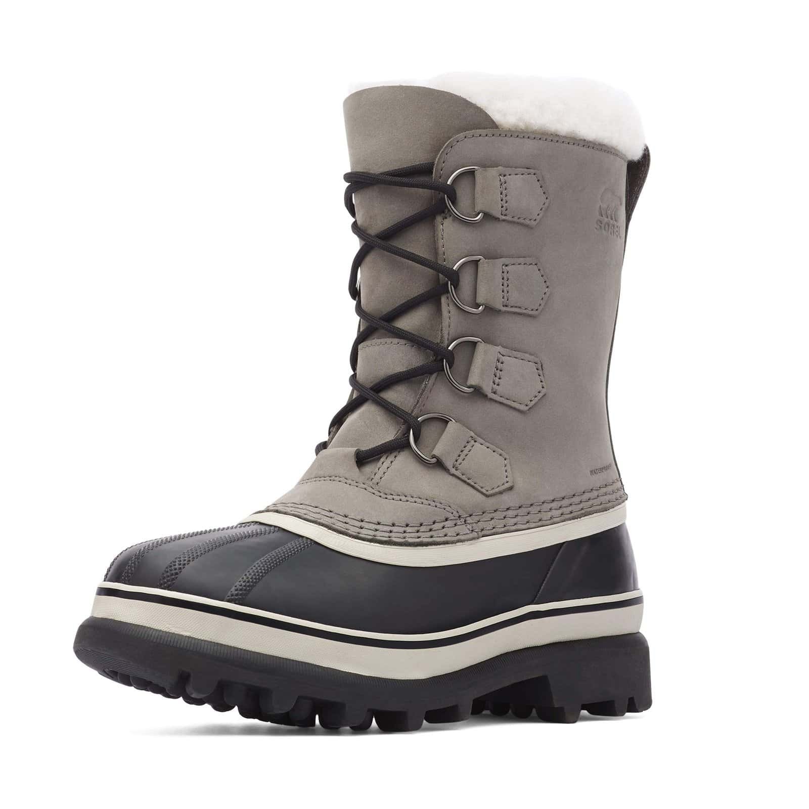 Sorel Caribou boots in snow with visible treads